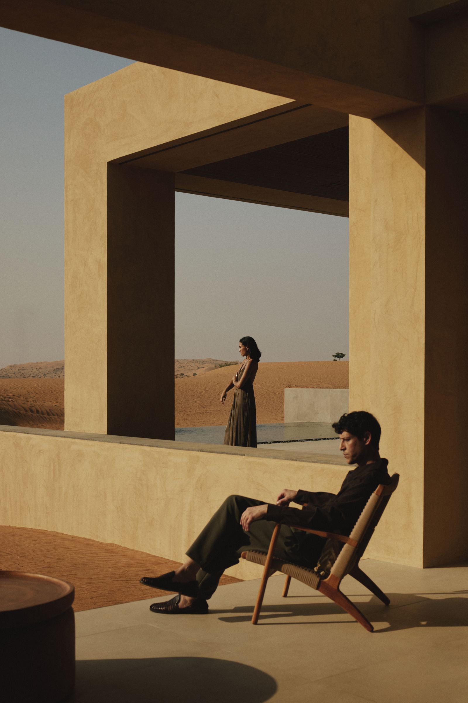 Residents on a shaded terrace